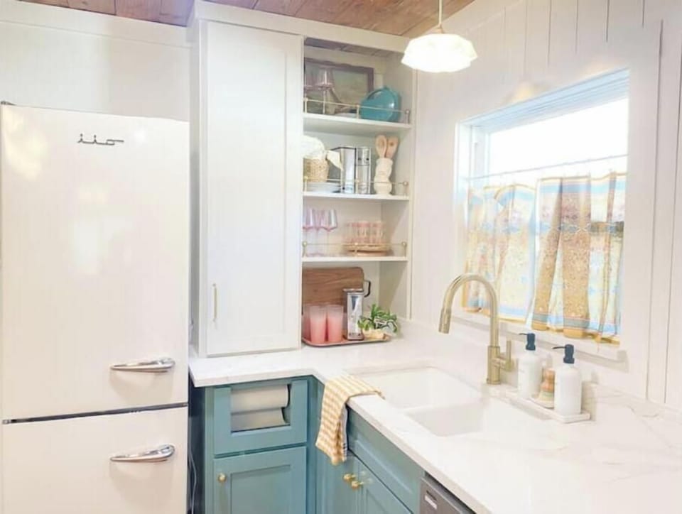 Large fridge & everything you need to dine at home
