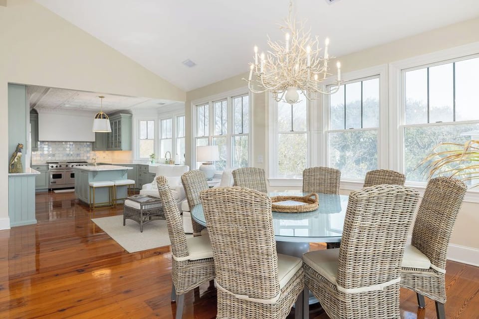 Just off the living room is your dining space featuring a large 8-seater dining table