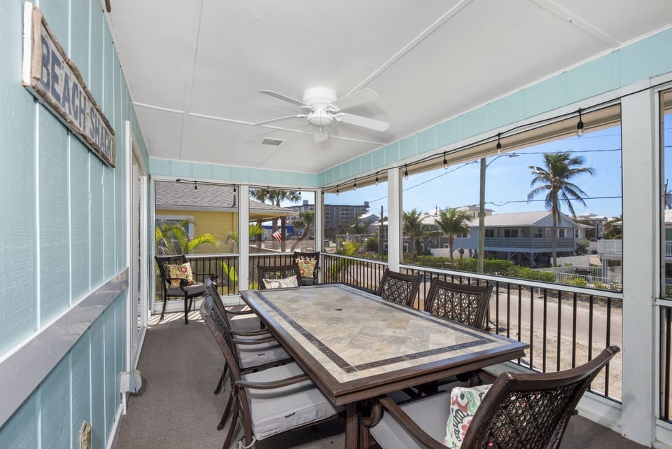 Upstairs dining room leads to outside sitting area