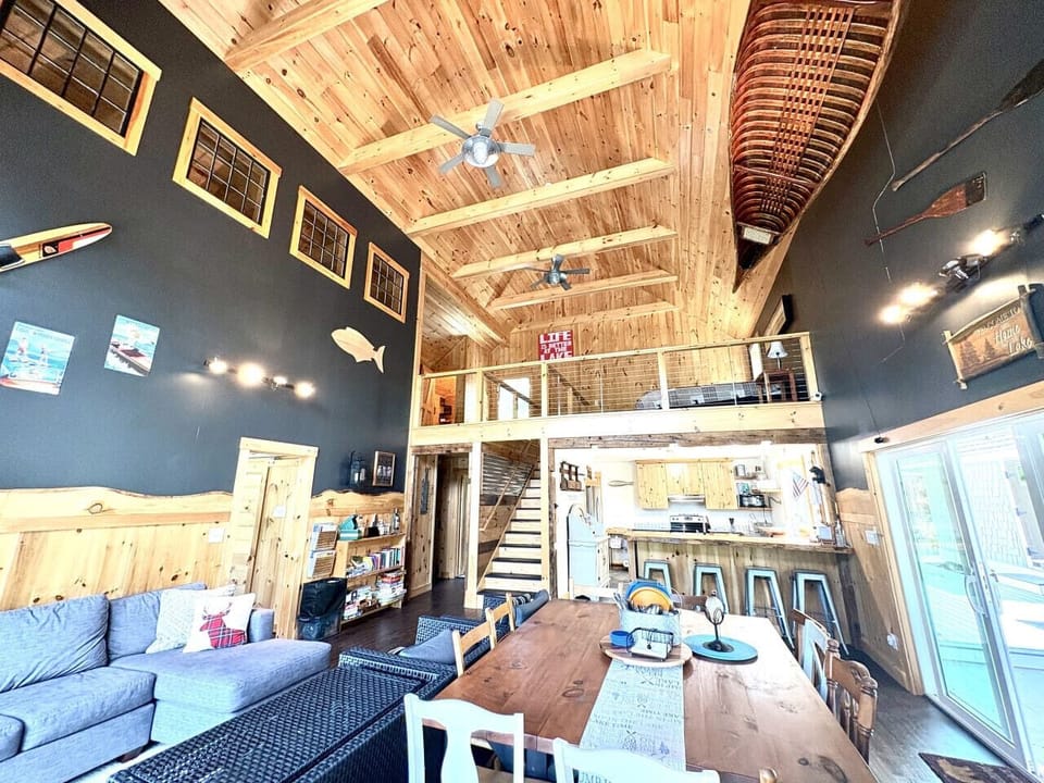Spacious lofted living room blending rustic charm and modern comfort.