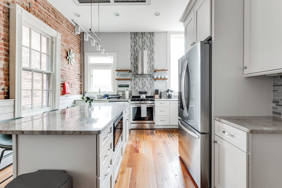 Kitchen: Whip up culinary delights in this stylish, sunlit oasis with vintage charm!