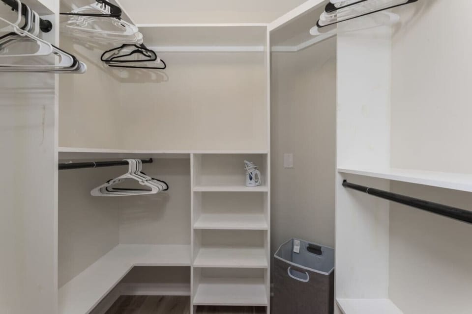 Spacious walk-in closet with plenty of storage for all your travel essentials.