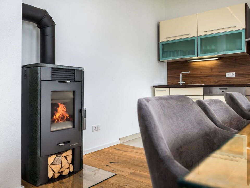 Flooring, Floor, Hearth, Wood-Burning Stove, Wood Stain, Hardwood, Home Appliance, Living Room, Wood Flooring