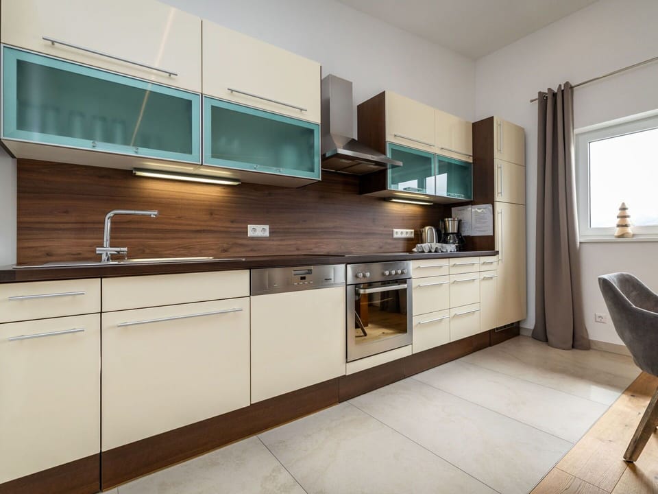 Flooring, Wood, Interior Design, Cabinetry, Kitchen Appliance, Countertop, Major Appliance, Kitchen, Floor, Furniture