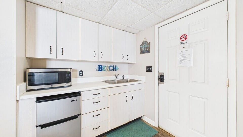 Kitchenette with basic cookware essentials