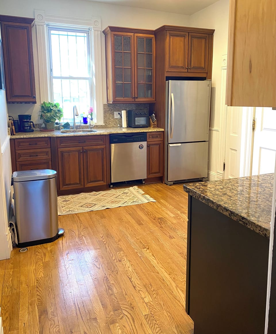 Kitchen with AirFryer, Microwave, two burner hot Plate, crockpot. 
Outdoor grill