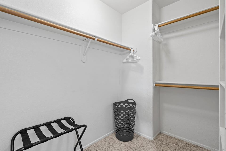 Walk-in closet provides space to spread out and stay organized.