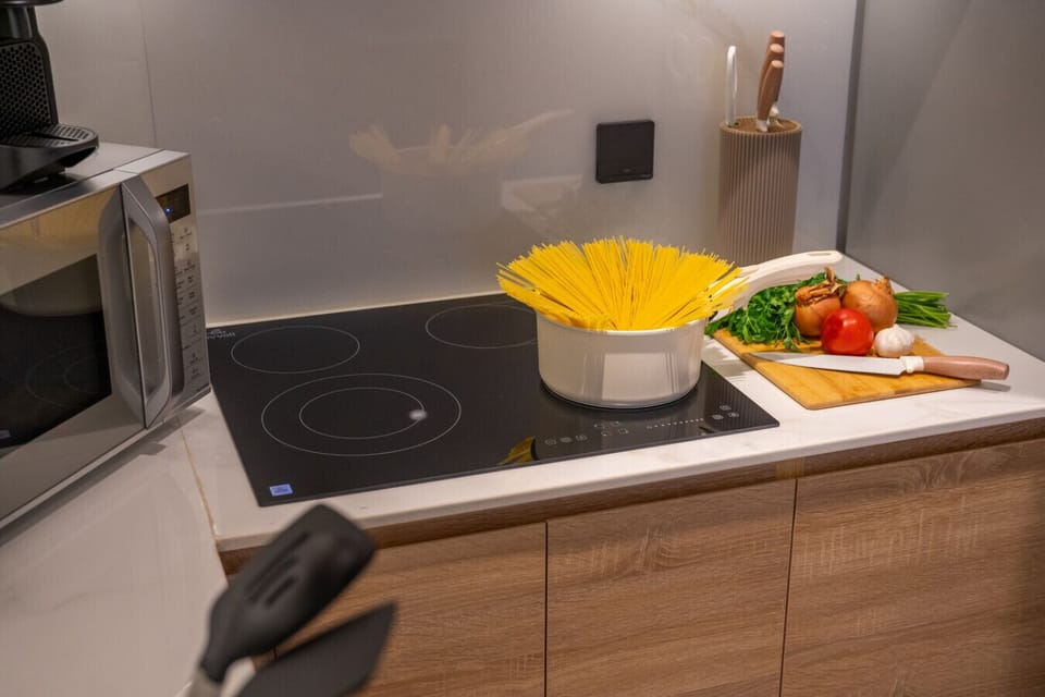 Fully equipped kitchen with modern appliances.