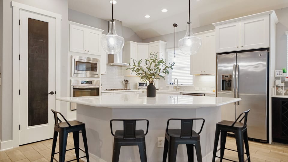 Enjoy making delicious meals in the chef's kitchen, complete with a huge island