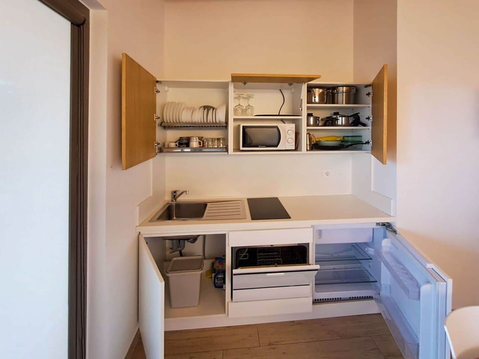Kitchen, Kitchen Appliance, Major Appliance, Wood, Cabinetry, Furniture, Interior Design, Countertop, Flooring, Home Appliance
