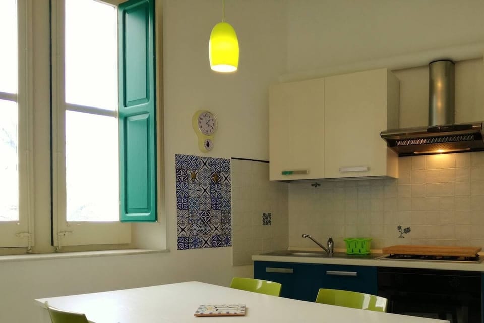Living room-kitchen with sea view, sofa bed and HD TV (4)