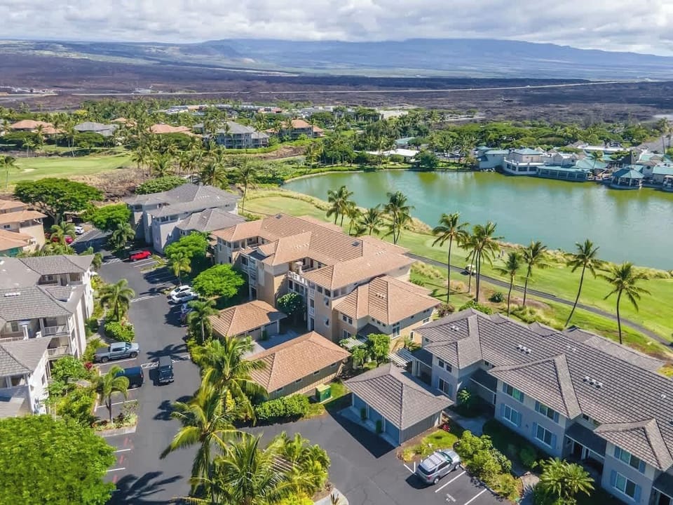 The exterior blends with the tropical setting, offering a calm and inviting atmosphere just minutes from the beach and local attractions.