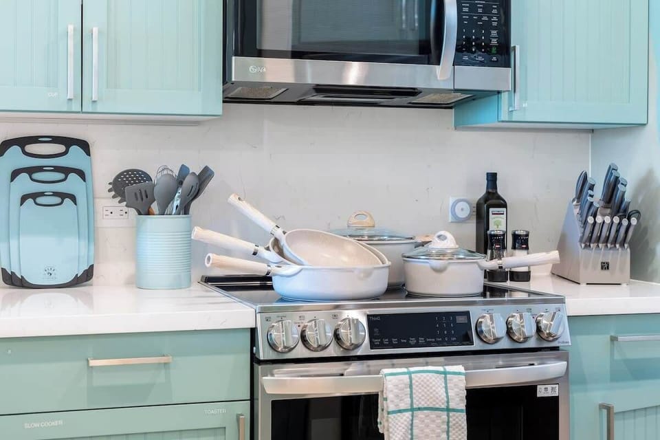 The kitchen comes stocked with cookware and features a high-end coffee maker for fresh brews each morning.