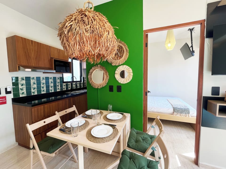 Jungle-infused dinners by night — collapsible table for extra room.
