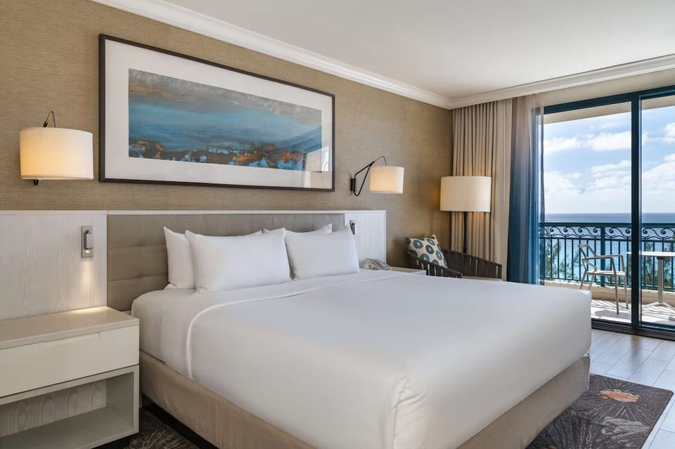 Unit with King bed. Exact unit will be assigned upon arrival. Views, colors, and decor may vary.