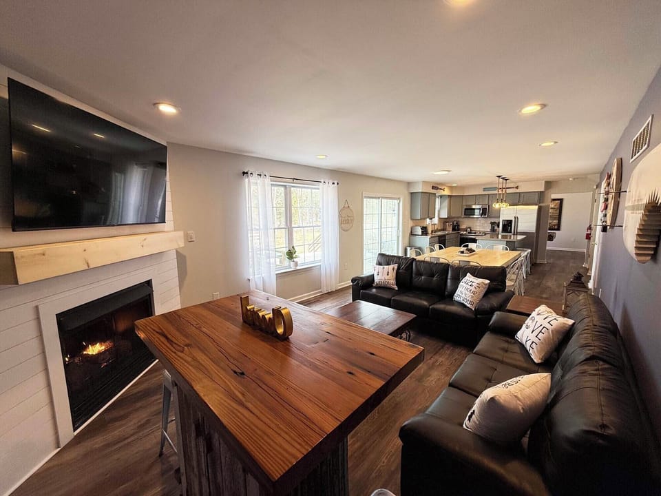 Open concept living, the kitchen flows into the dining & living room areas.