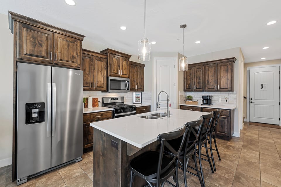 Kitchen and walk-in pantry are stocked with everything you need to prepare meals