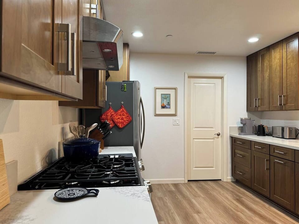 Lots of counter space for helpful hands in the kitchen to prepare some good home cooking or gourmet meals. Cooking oil, olive oil, salt, pepper and spices provided.