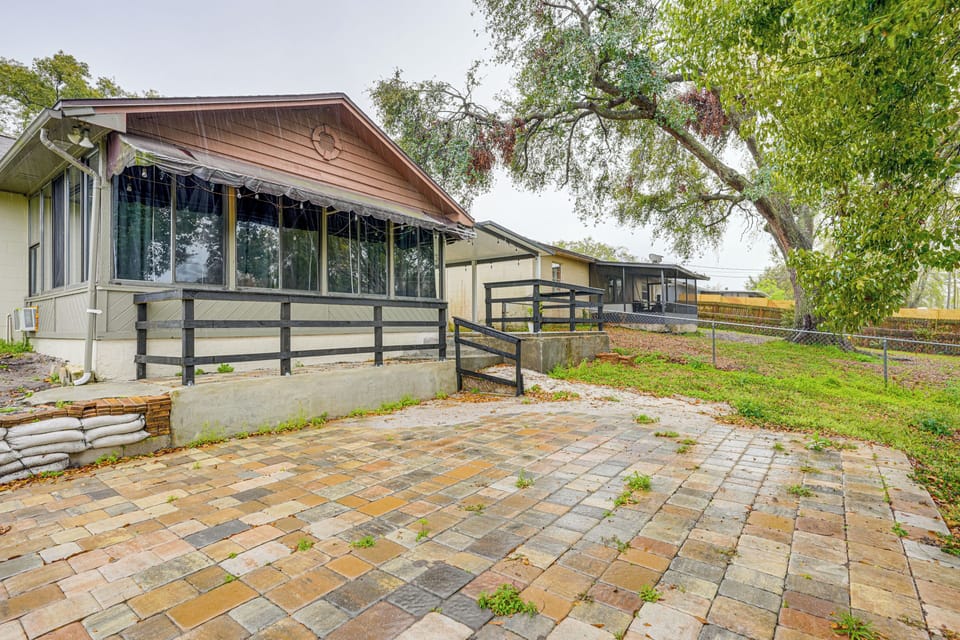 Uncovered & Covered Patios | Grassy Yard | Single-Story Home