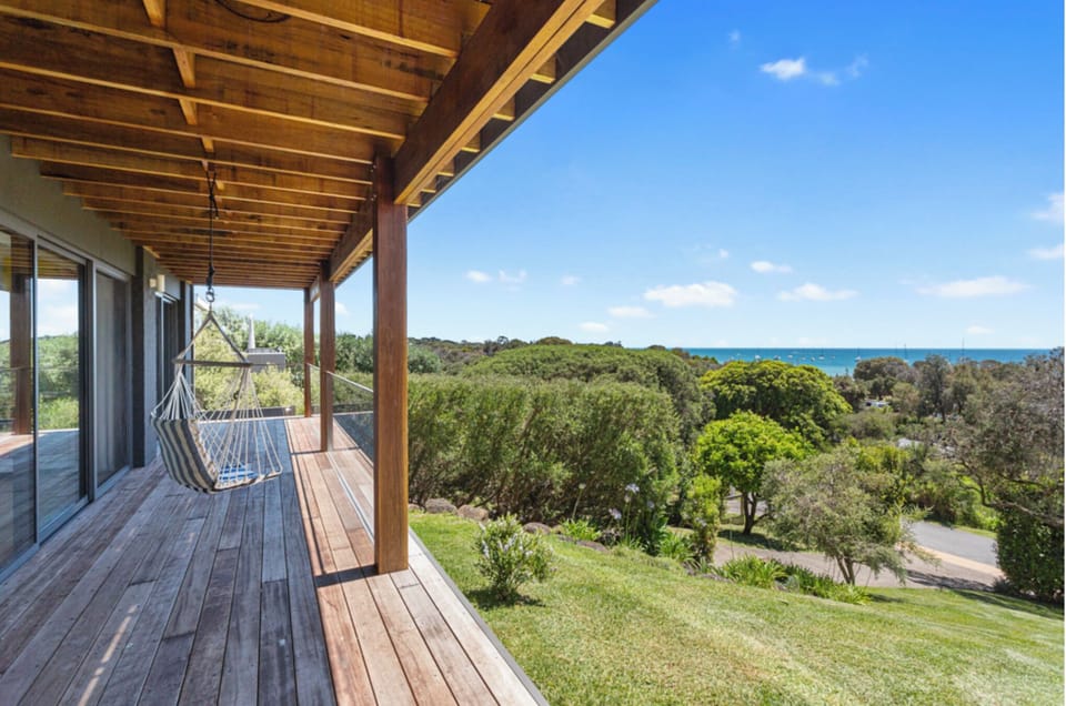 Lvl 1 Verandah overlooking Bay accessible from Queen & Twin Rooms & lower lounge