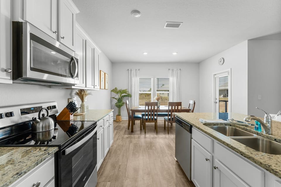 Fully stocked kitchen with modern appliances and plenty of space to cook!