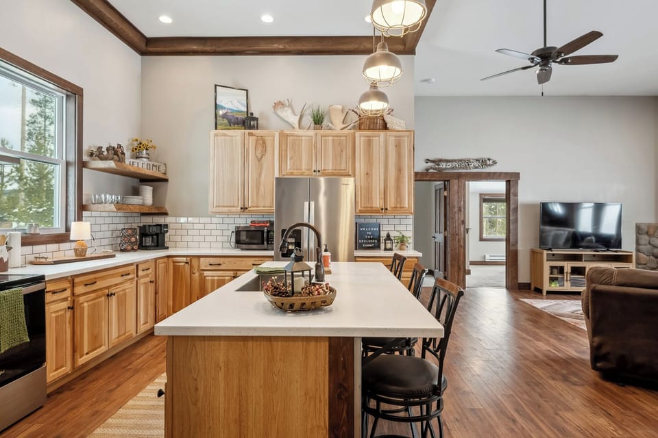 Fully stocked kitchen with large island. 