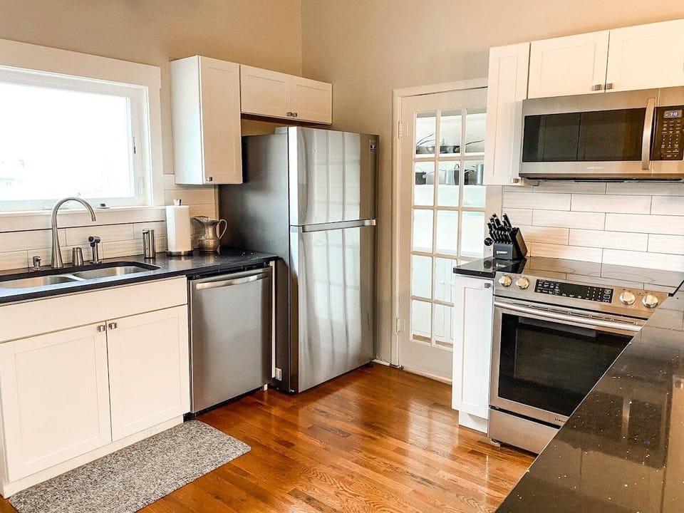 Cook your favorite meals in the stocked kitchen that comes with an electric stove, fridge, microwave. Essentials such as salt, pepper, cooking oil are provided.