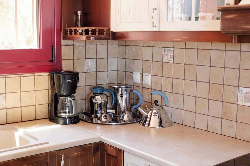 Coffee Station with Espresso Machine and Essentials – Perfect for starting the day with freshly brewed coffee.