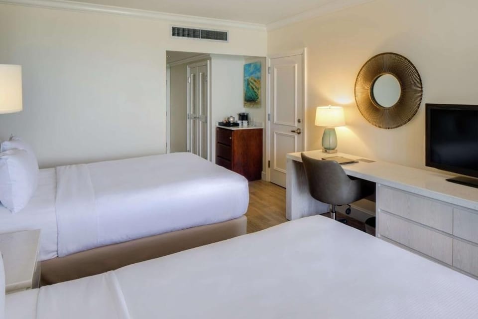Unit with 2 Double beds. Exact unit will be assigned upon arrival. Views, colors, and decor may vary.