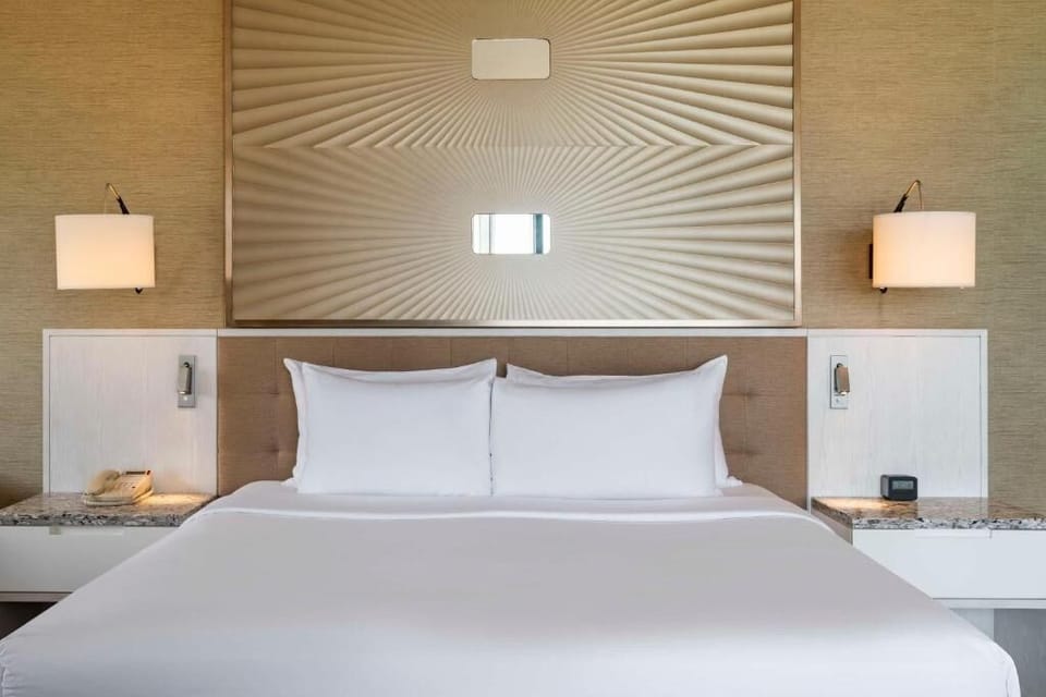 Unit with King bed. Exact unit will be assigned upon arrival. Views, colors, and decor may vary.