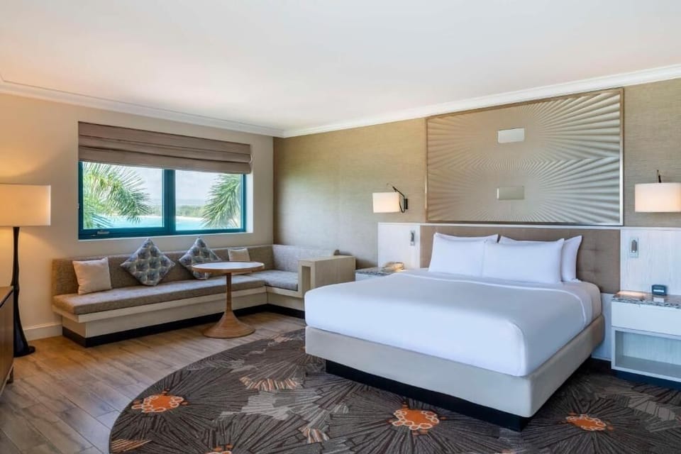 Unit with King bed. Exact unit will be assigned upon arrival. Views, colors, and decor may vary.