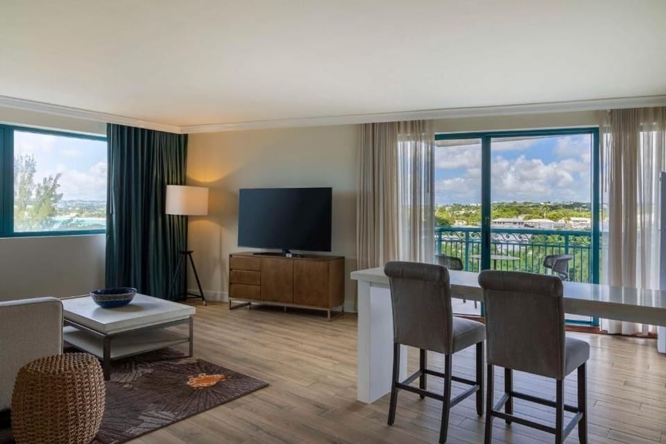 Living area. Exact unit will be assigned upon arrival. Views, colors, and decor may vary.