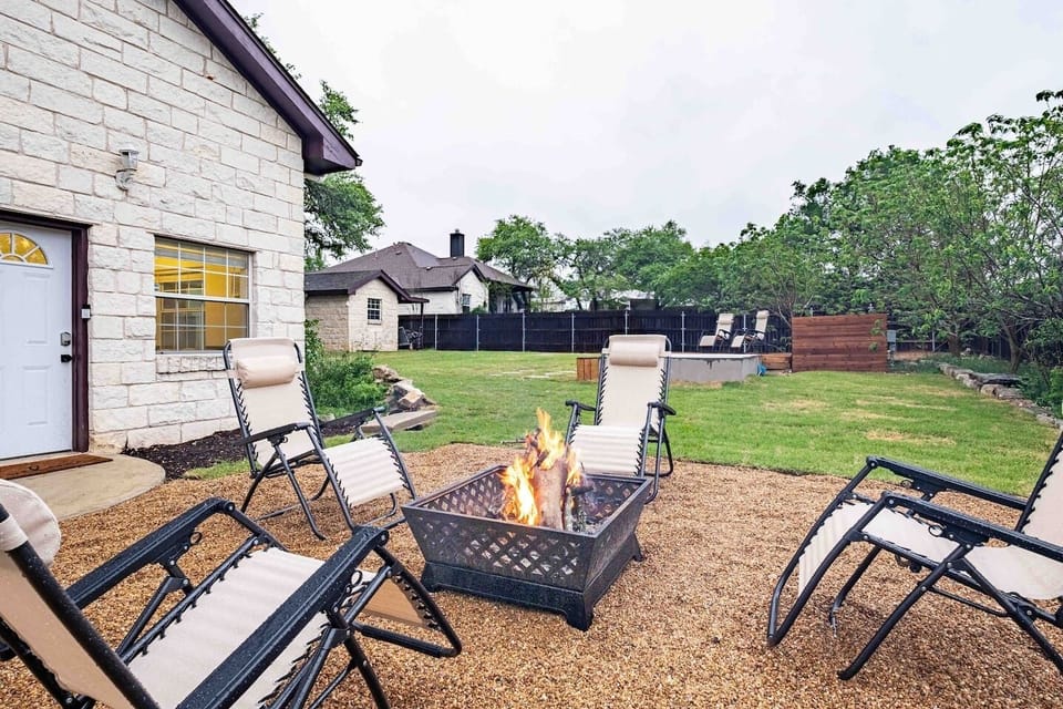 The perfect combination of relaxation and fun: Our pool and fire pit with stunning views make for a memorable stay in Dripping Springs.
