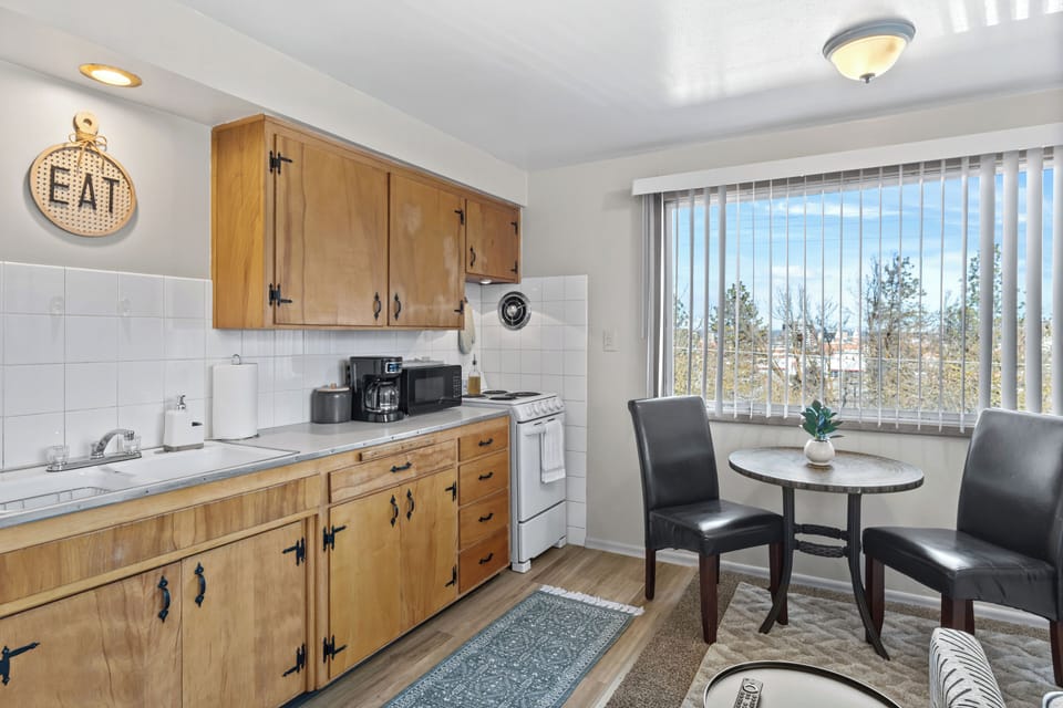 Fully equipped kitchen with essentials for a comfortable, convenient stay.