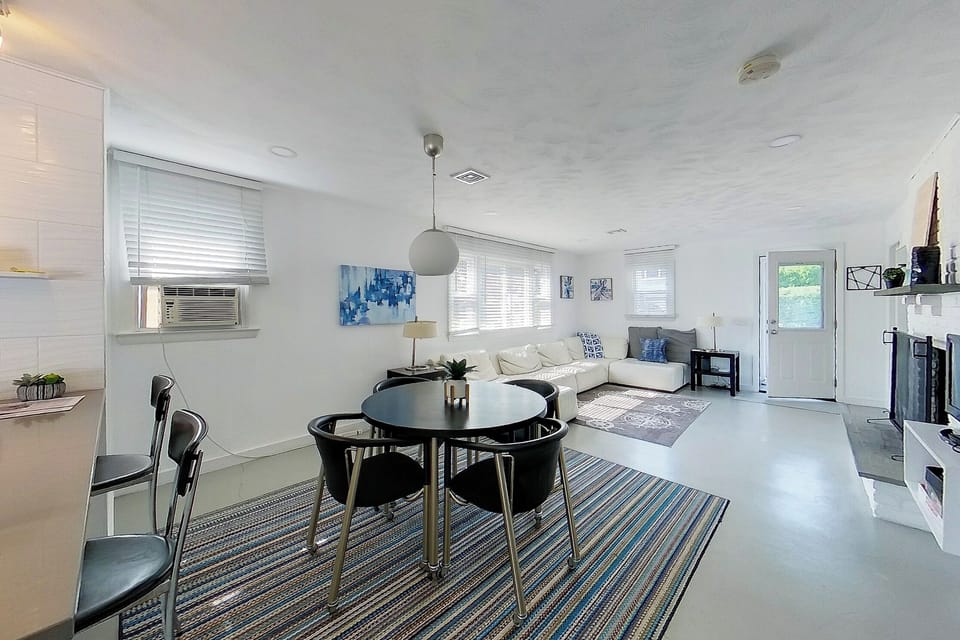 The open living area has a modern concrete floor for coolness during hot summer days. 