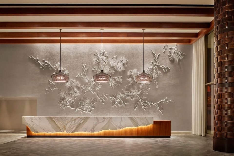 Arrive in style to a serene, design-forward lobby.