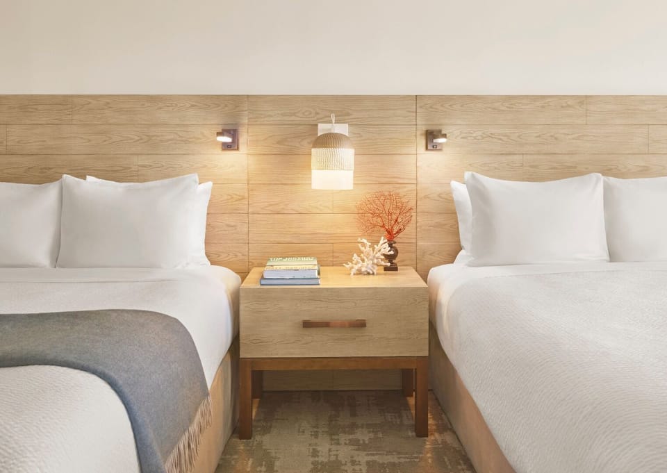 Settle in comfortably with two plush beds and warm lighting.