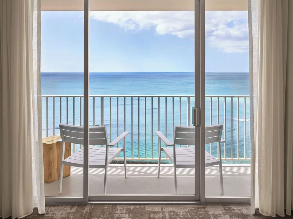 Sip morning coffee while watching waves from the balcony