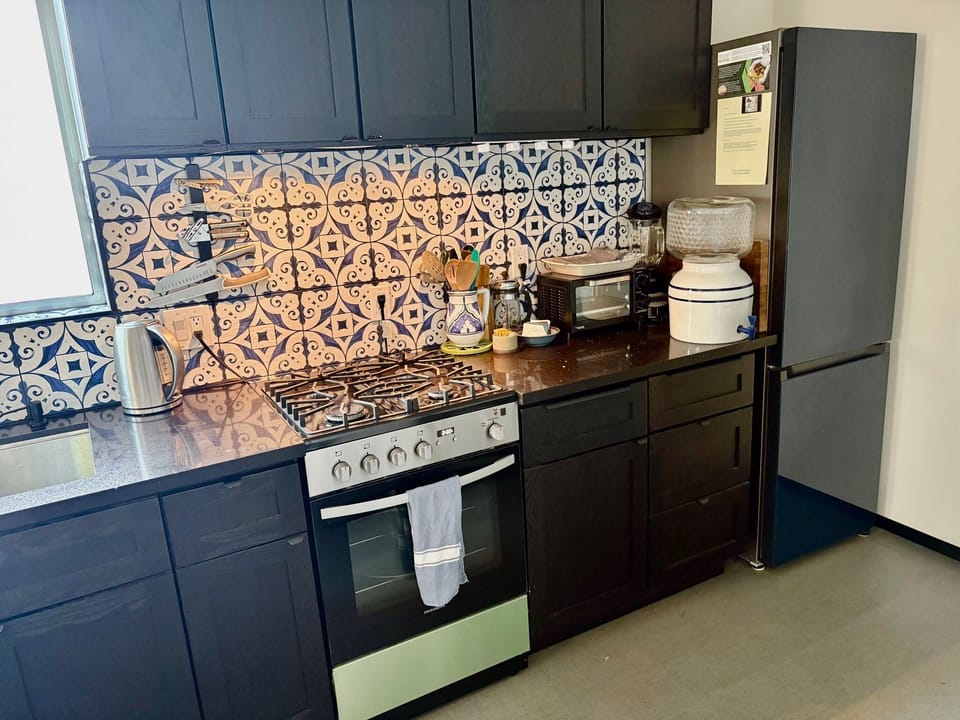 Gas Stove. bottom freezer fridge. water dispenser. Home cooking ready.