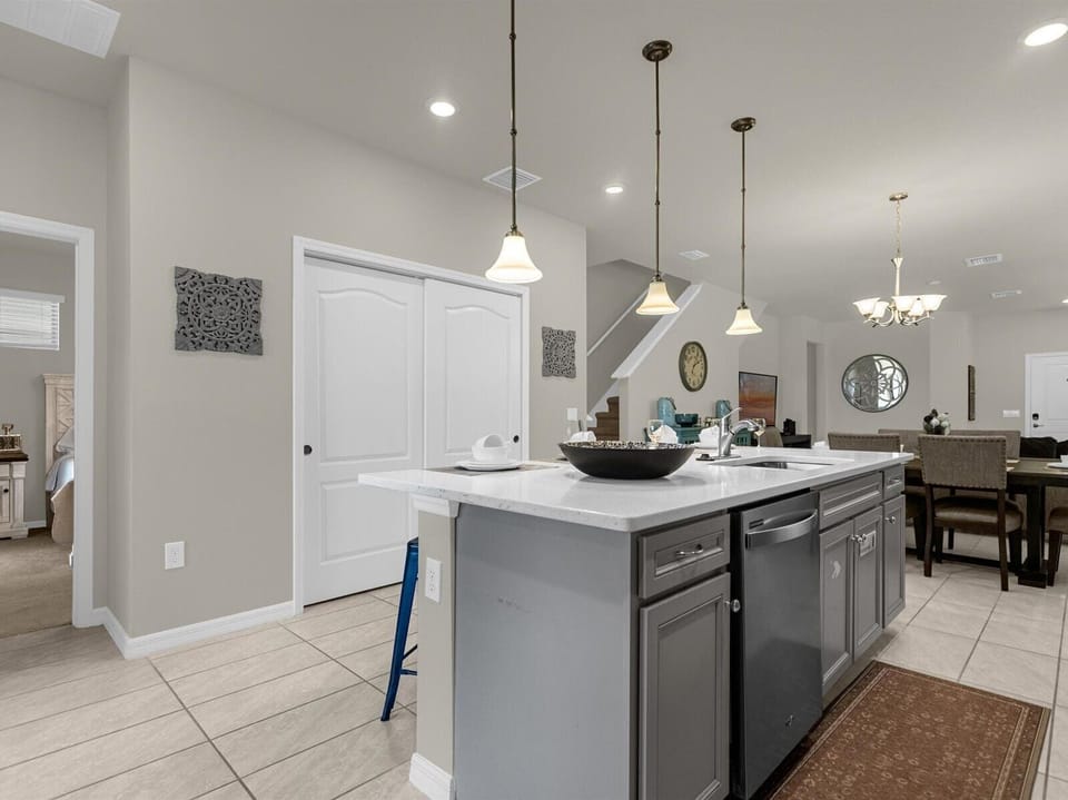 Kitchen | The island makes cooking and serving meals a breeze.