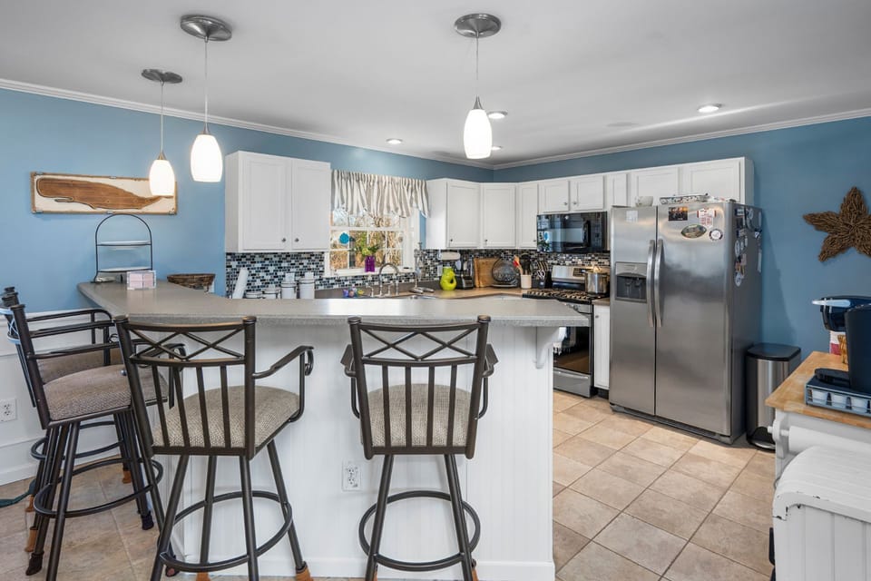 A kitchen island with seating for four