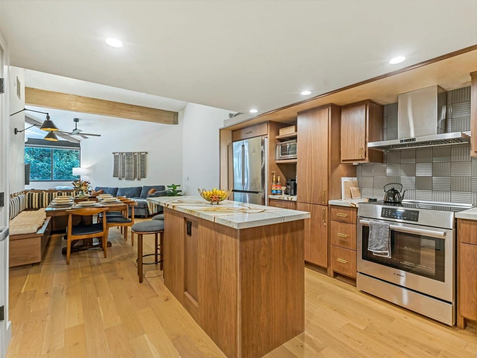 Kitchen's stocked with induction oven, air fryer, stainless steel cookware