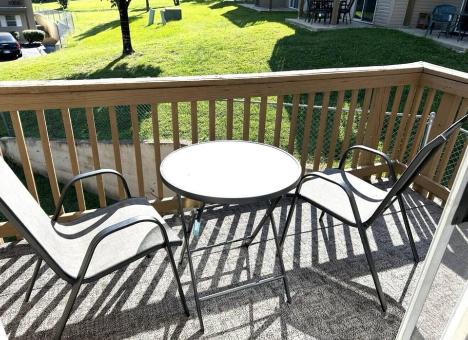 Balcony seating for two. No smoking allowed in or out of condo.