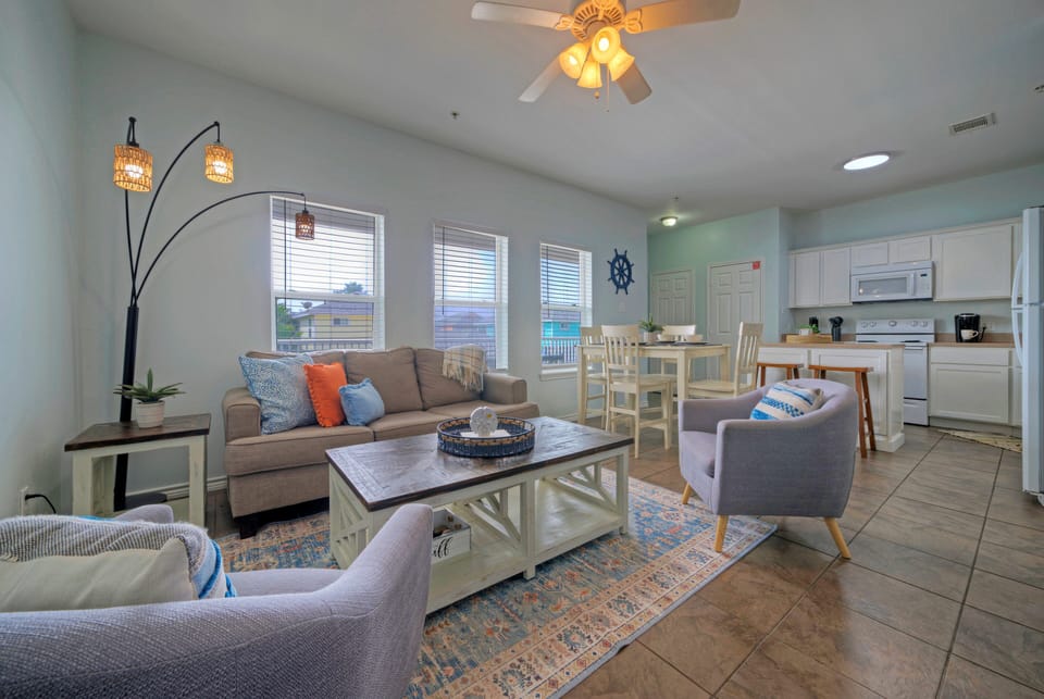 The living room features a sleep sofa for additional guests.