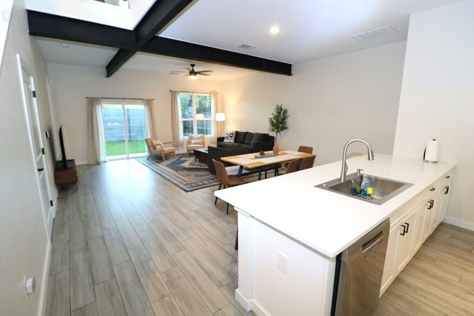Dining Area with Open Kitchen and Living Room Views