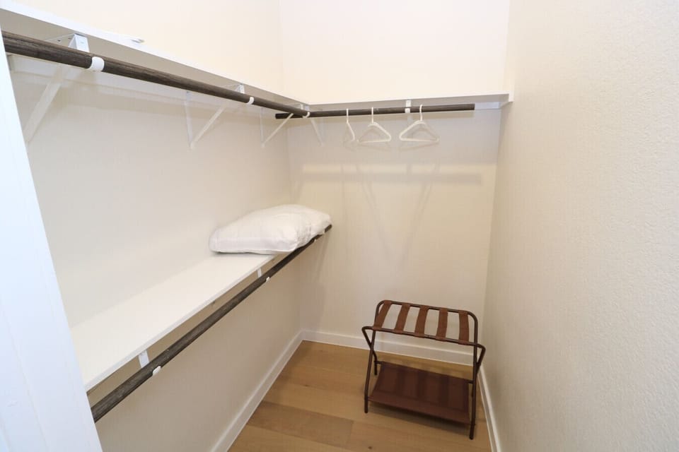storage room with hanging racks