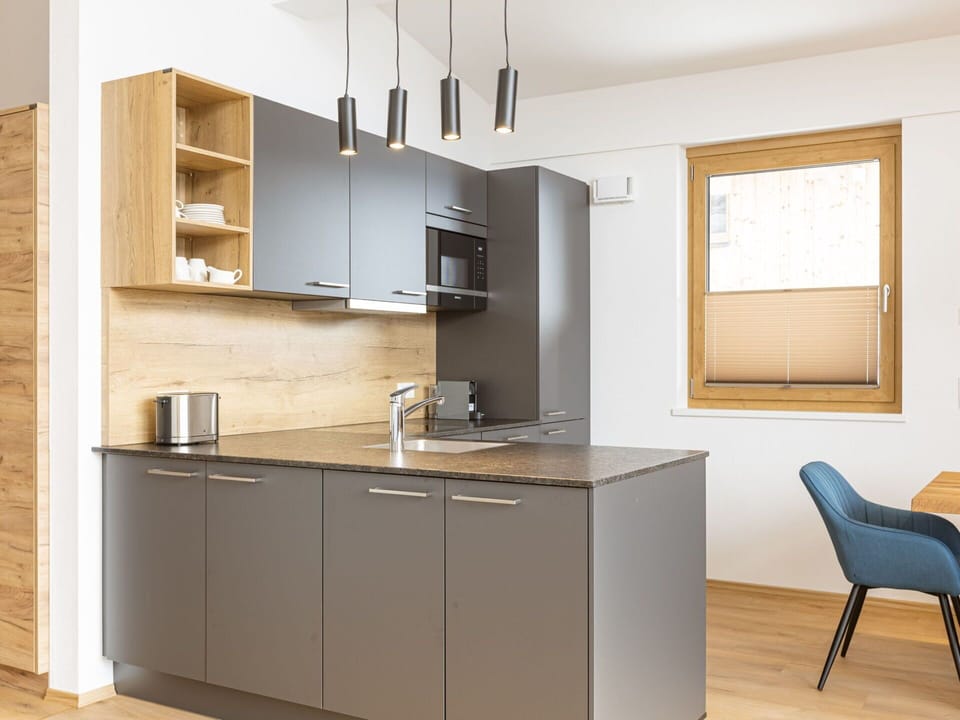 Furniture, Kitchen, Countertop, Flooring, Cabinetry, Interior Design, Wood, Floor, Kitchen Appliance, Cupboard