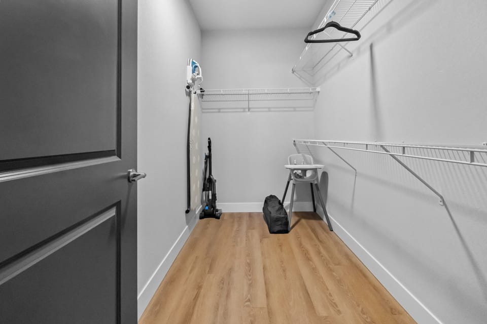 Master Closet Offers Plenty of Storage and a Full Size Ironing Board and Iron. Spill Something? Use the Vacuum to Make the Clean-Up Simple. 
You'll also find a Pack n Play and Highchair for your little one!