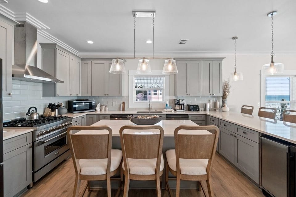 Your spacious kitchen invites you to prepare memorable meals with modern appliances and elegant countertops for gathering around.