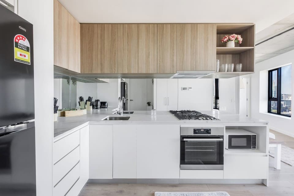Whip up delicious meals in the fully equipped kitchen, complete with an oven, dishwasher and coffee essentials for your morning ritual.